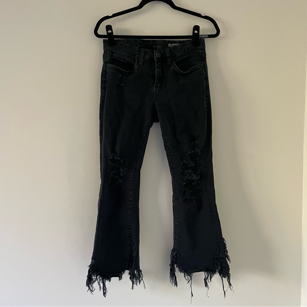Distressed flare jeans